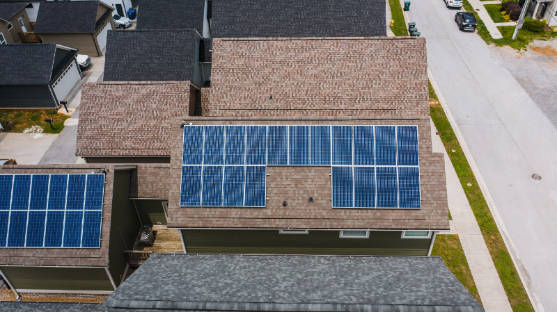 Solar panels on a brown home roof