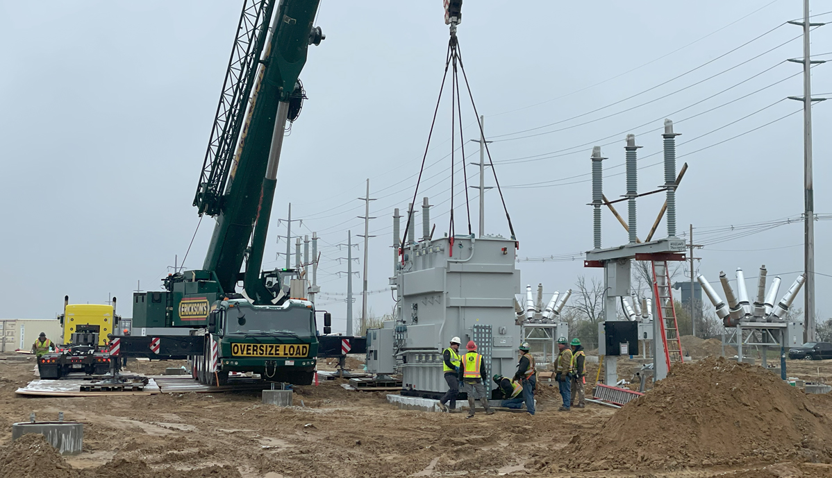 transformer being placed in position during construction of the East Point Substation