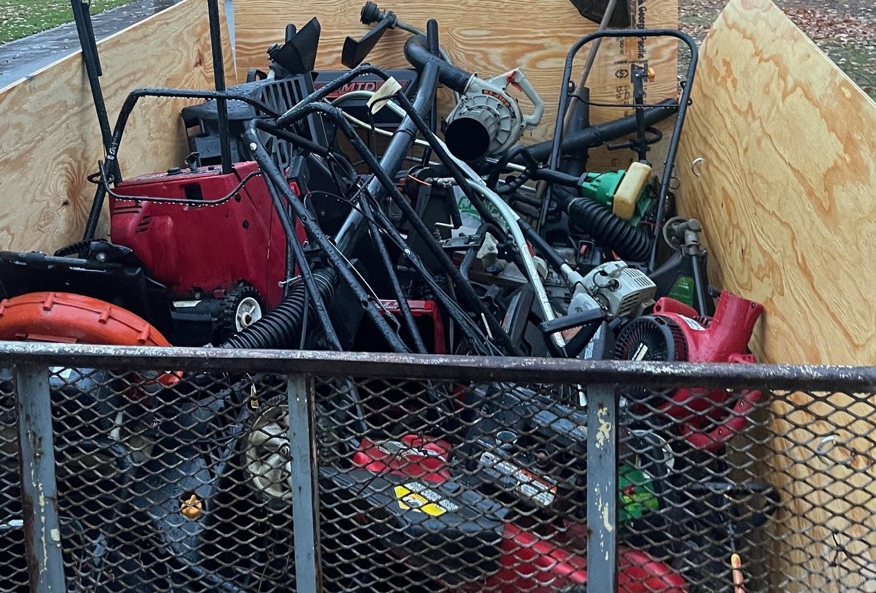 Trailer full of old lawn equipment to be recycled