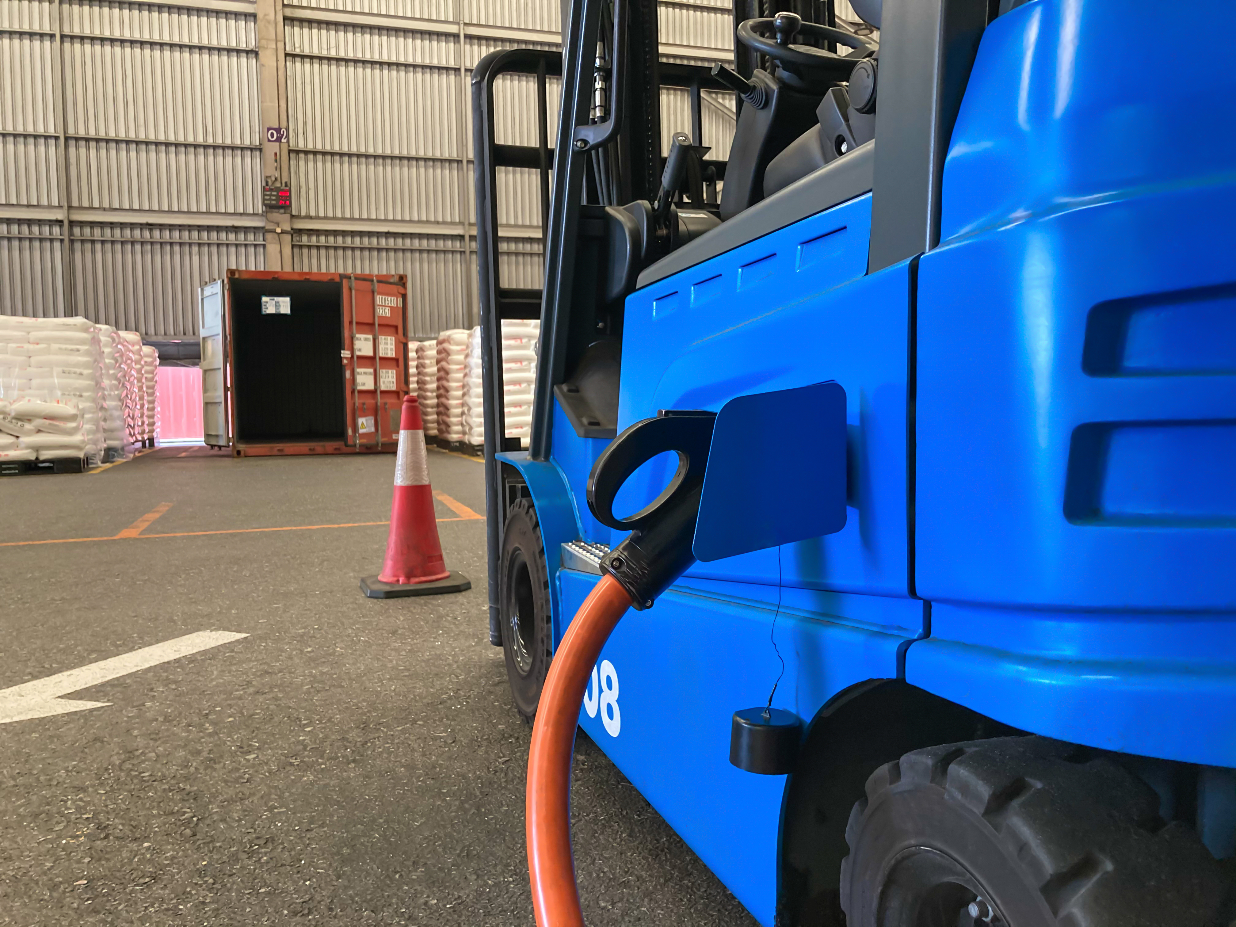 Electric forklift charging in a warehouse