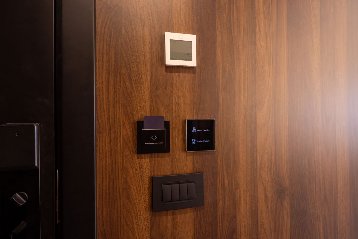 hotel thermostat controls in a room