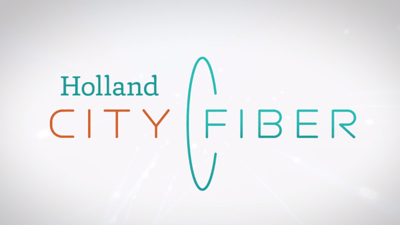 holland city fiber logo on a gray background